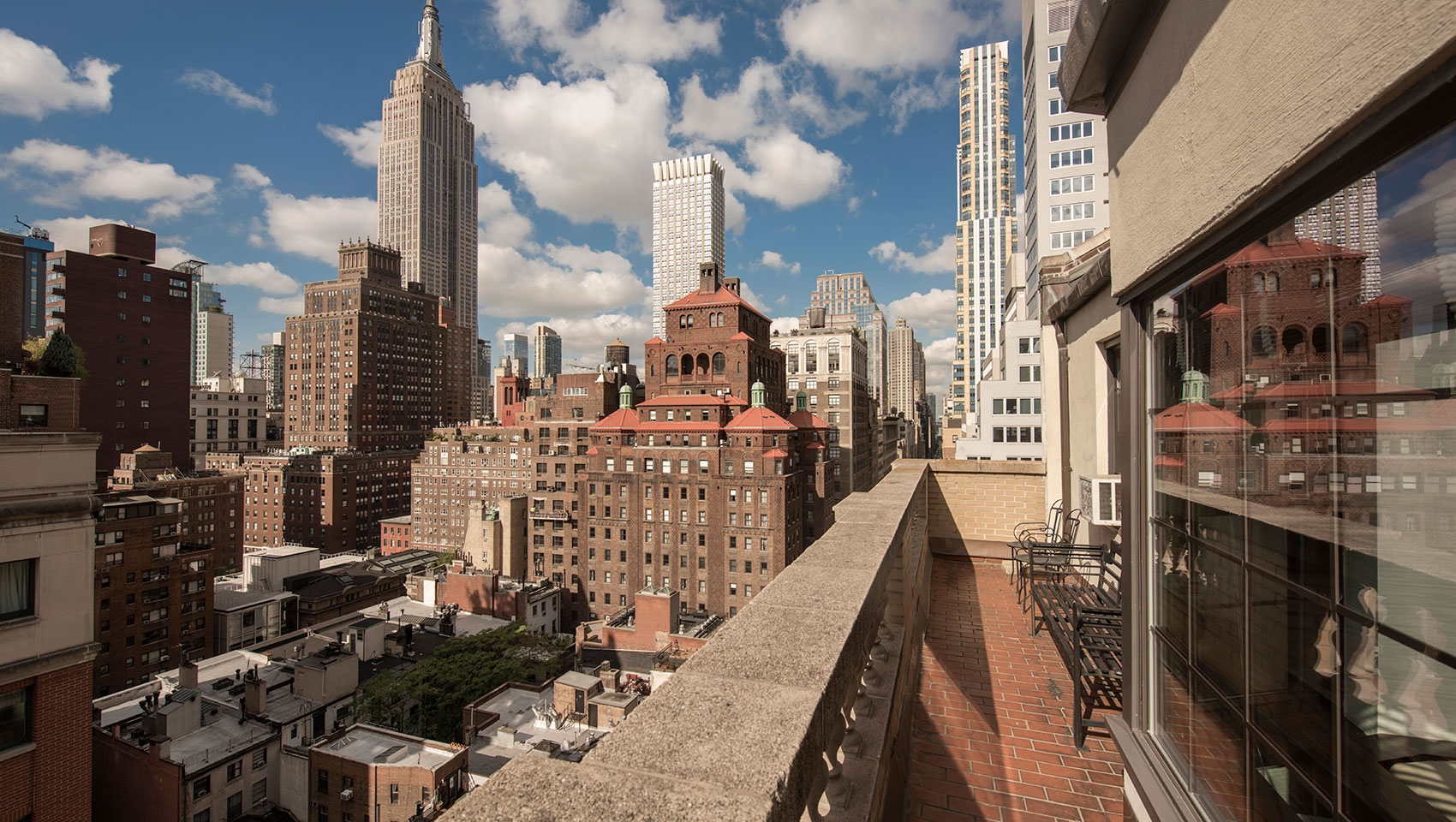 view of empire state building from balcony